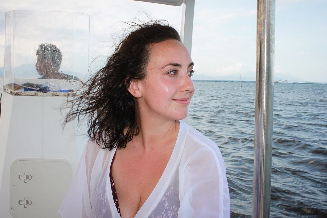 santosha yoga teacher training student on boat