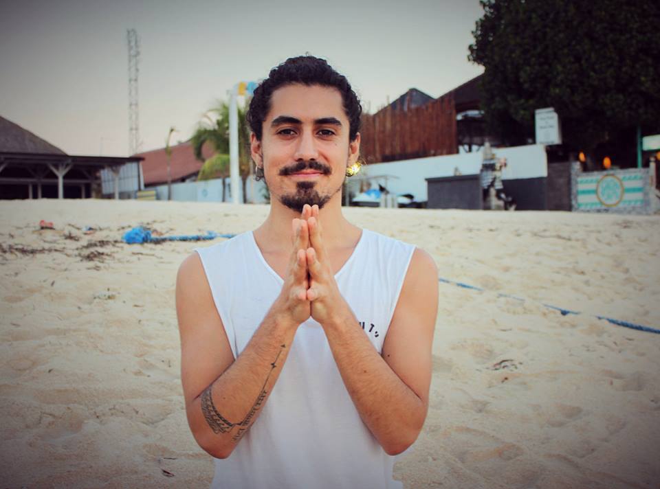 santosha yoga teacher training teacher on beach