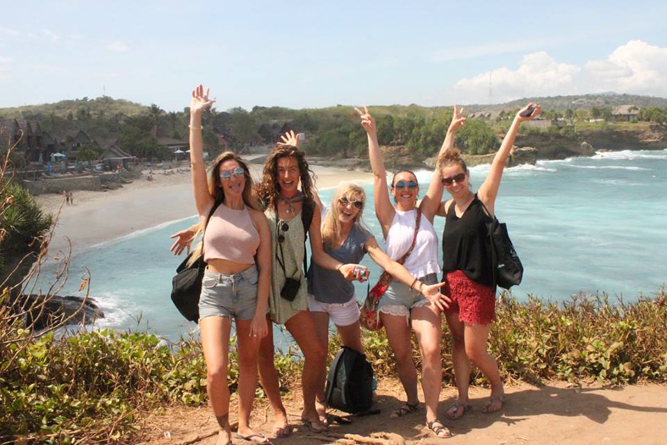 santosha yoga teacher training students in front of beach