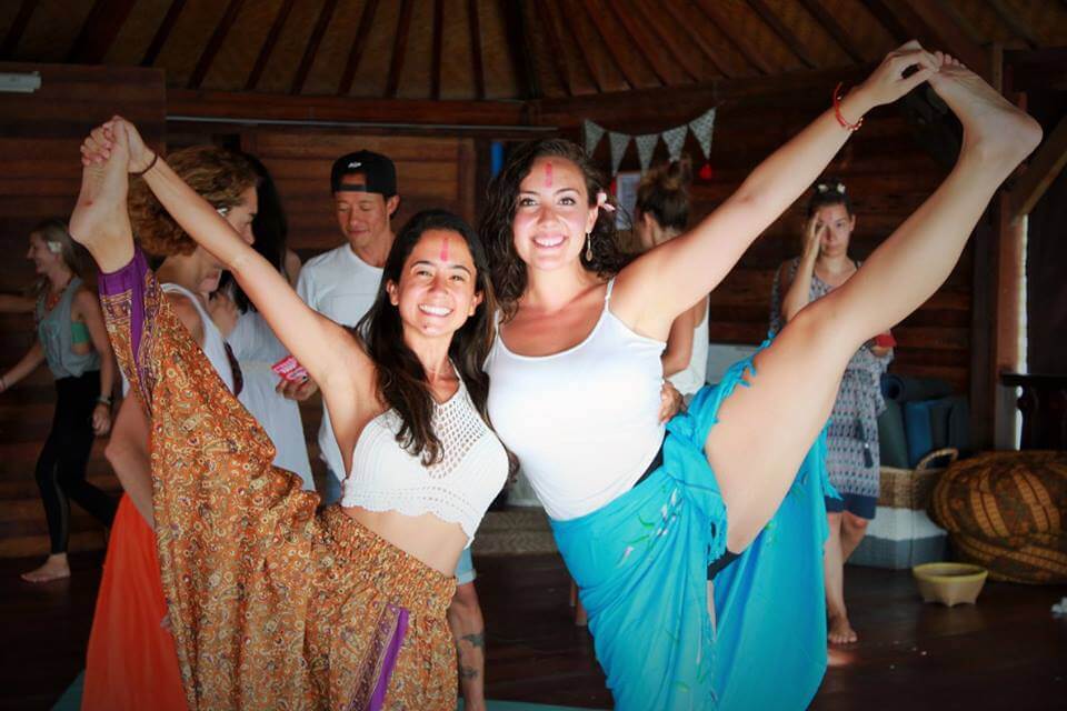 santosha yoga teacher training two students doing yoga