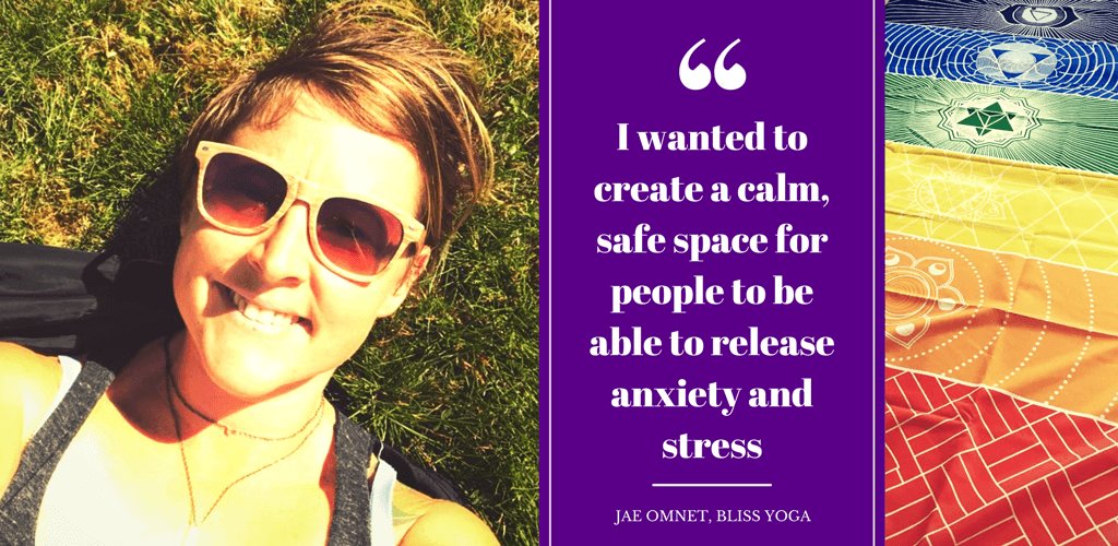 santosha yoga teacher training graduate jae lying on grass