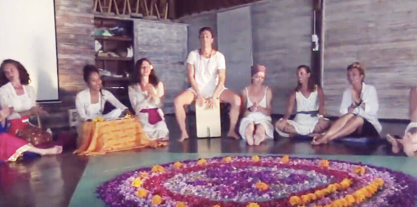 yoga teacher training students in circle at graduation 