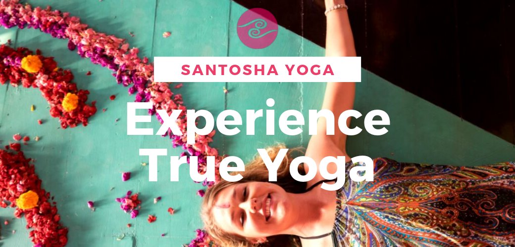 Yoga Teacher Training Student lying on flowers