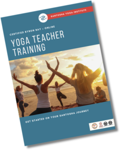 A promotional image for Byron Bay Yoga Teacher Training by Santosha Yoga Institute. It features a group of people practicing yoga on a beach at sunset, with the text 